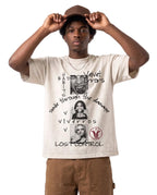 White Lost Control Wash Tee by Velvet Errors displayed on a model, showcasing the relaxed fit and casual style.