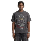 Black True Lies Wash Tee by Velvet Errors displayed on a model, showcasing a casual fit and graphic design on the front.