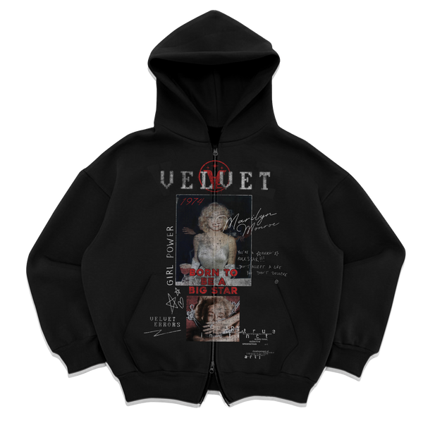 Close-up of Velvet Errors' new zip-up mocks featuring a sleek velvet fabric and modern design.