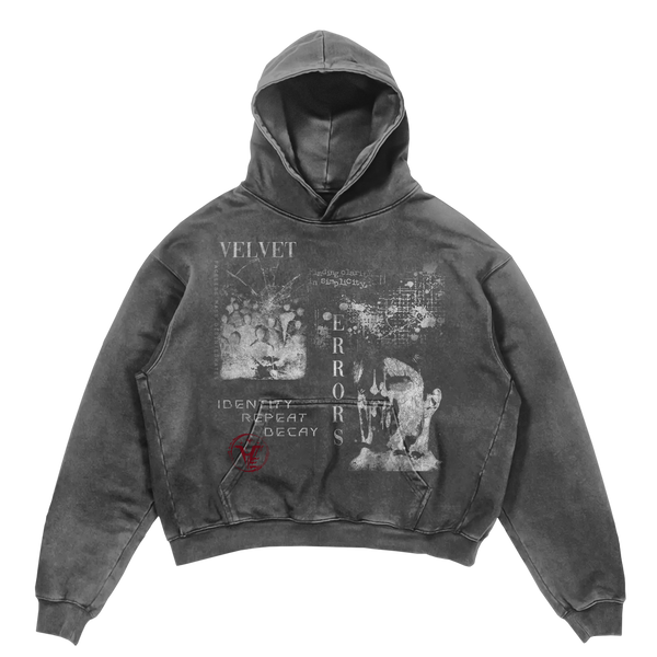 Black Decay Hoodie by Velvet Errors, featuring a distressed design and soft fabric, shown on a model.