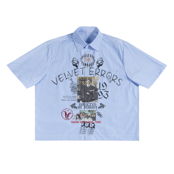 Velvet Errors True Lies button-up shirt in dark fabric, featuring a classic collar and long sleeves.